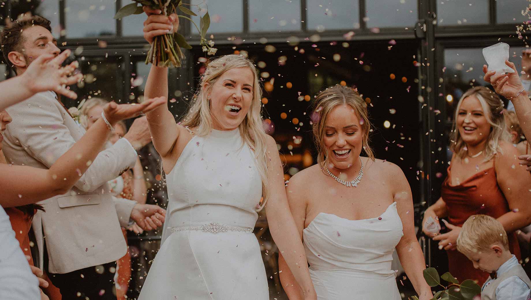 An image of two women celebrating their wedding.